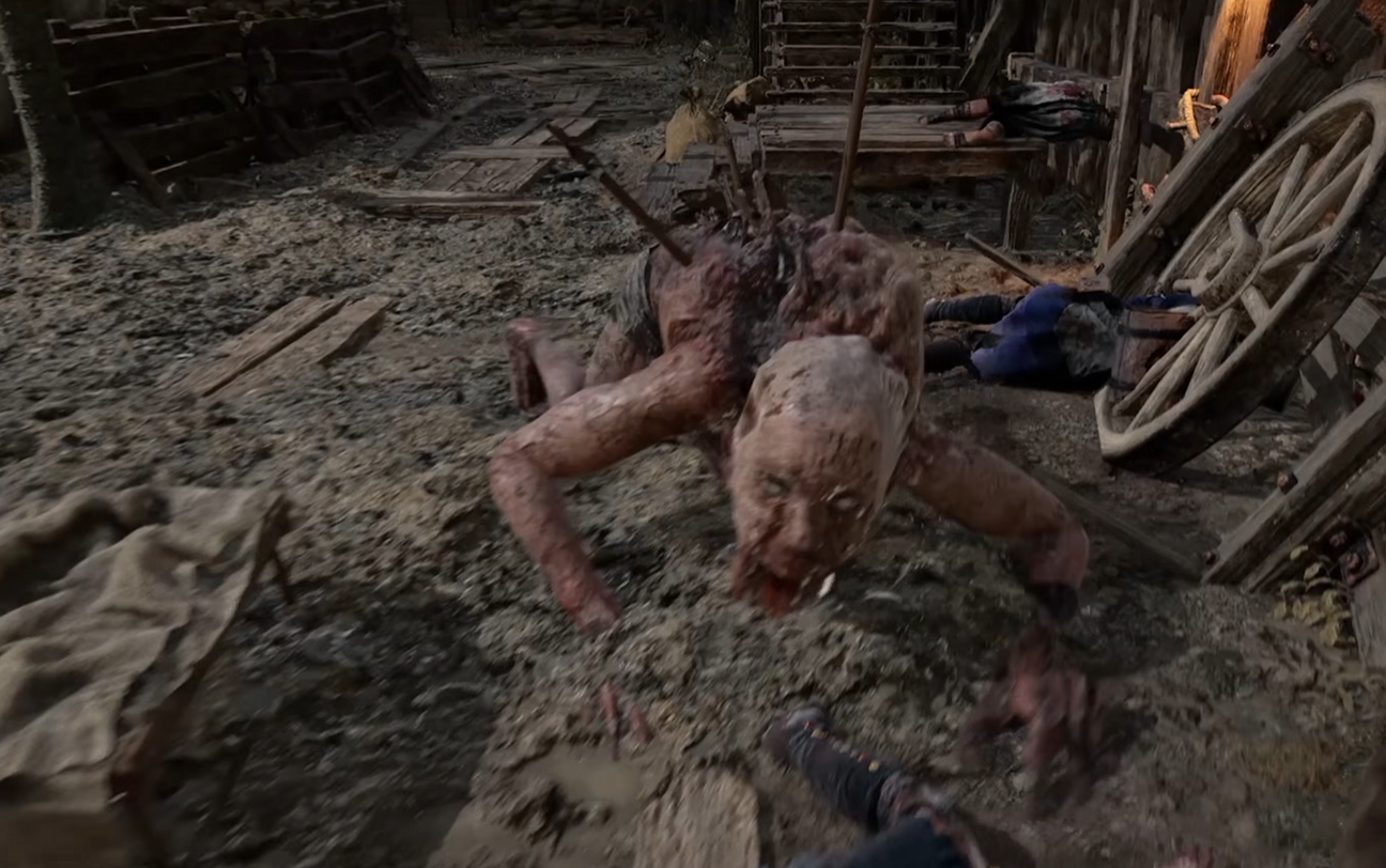 Drooler crawling towards the player in a wooden camp